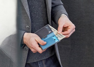 Compact men's wallet for easy organization and a dedicated bill compartment to securely hold bills