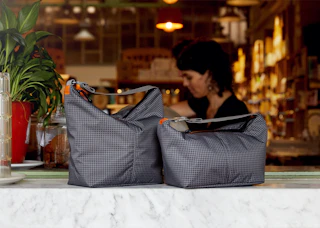 Versatile outdoor cooler to keep a 6-pack cold during a picnic